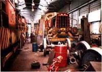Industrial locomotives undergoing repair in the locomotive shed.<br><br>[Ewan Crawford //]