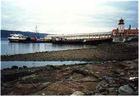 Wemyss Bay station and pier with a Caledonian MacBrayne ferry at the pier.<br><br>[Ewan Crawford //]