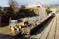 Class 37 hauled ballast train being loaded at Kyle of Lochalsh. View looks north.<br><br>[Ewan Crawford //]