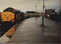 Class 37 with passenger train in Mallaig station. View looks north.<br><br>[Ewan Crawford //]