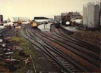Mallaig station viewed from the south with class 37 and passenger train in station.<br><br>[Ewan Crawford //]