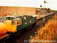 Class 27 hauling a freight train west through the former Cambus station.<br><br>[Jeffray Wotherspoon //]