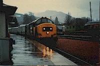 Class 37 hauled passenger train running north at Crianlarich.<br><br>[Ewan Crawford //]