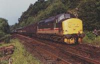 Class 37 hauled sleeper entering Arrochar and Tarbet station from the south.<br><br>[Ewan Crawford //]