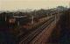 Northbound empty steel coil wagons for Ravenscraig running north to Mossend via Holytown passing Law Junction.<br><br>[Ewan Crawford //]