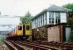 View looking north at Milngavie signalbox. Class 314 heading south. Access by kind permission of British Rail.<br><br>[Ewan Crawford //]