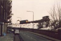 Class 47 at Trinity during the lifting of the line between Granton and Powderhall. View looks west.<br><br>[Alan Bain //]