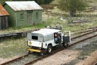 First Engineering road/rail vehicle alongside Rannoch station in May 2003.<br><br>[John Furnevel /05/2003]