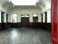 The striking entrance and former booking hall at Elgin East, September 2004. The old building is now in use as commercial offices.<br><br>[John Furnevel 12/09/2004]