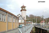 Looking from the pier at the station. The curved walkway between station and pier is to the left. To the right is the slipway for the Caledonian MacBrayne roll-on roll-off ferries which run from here to Rothesay.<br><br>[Ewan Crawford 4/6/2004]