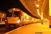 A 334 train prepares to leave platform 2 for Glasgow.<br><br>[Ewan Crawford 4/6/2004]