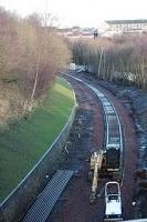 View looking north as the track approaches Dawsholm from the north.<br><br>[Ewan Crawford 18/12/2004]