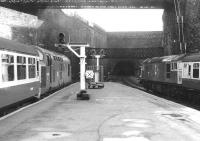 End of the platform scene at Glasgow Queen Street in May 1981, with 37035 waiting to leave with a train for Oban. Standing on the right is 27001.<br><br>[John Furnevel 05/05/1981]