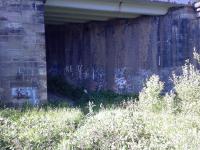 This view looks north at the point where the fly-under went under the main line and headed towards Cart Junction. The track bed here is now part of the cycle network.<br><br>[Graham Morgan 26/06/2006]