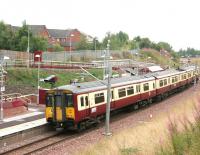 A Larkhall - Dalmuir train pulls away from Merryton in August 2006.<br><br>[John Furnevel 18/08/2006]