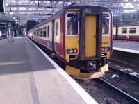 Class 156 156494 at Glasgow Central.<br><br>[Graham Morgan 12/08/2006]
