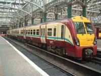 Juniper Class 334023 sitting in Platform 10 at Glasgow Central.<br><br>[Colin Harkins 07/07/2005]