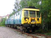 Preserved <I>Blue Train</I> exhibit, former unit 311103, photographed at Summerlee in August 2006. By this time DTS vehicle 977846 had been removed from the formation and scrapped, with the two remaining cars relocated here at the rear of the yard alongside the Whifflet line. [See image 29597] <br><br>[John Furnevel 29/08/2006]