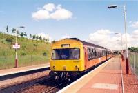 Westbound DMU pauses at Carmyle. Shortly before withdrawl of the 101s.<br><br>[Ewan Crawford //1998]