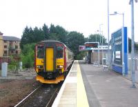 A train for Glasgow Central about to depart from East Kilbride in August 2006.<br><br>[John Furnevel 21/08/2006]
