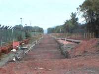 Looking towards Blackgrange, the excavated trackbed, along with a set of new points for a passing loop<br><br>[Brian Forbes /08/2006]