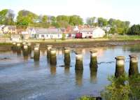 Surviving piers of the railway bridge that carried the line between Leuchars Junction and St Andrews over the River Eden. Seen here in May 2005 looking north west across the estuary back towards Leuchars.<br><br>[John Furnevel 19/05/2005]