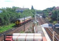 Train stabled on the Whifflet South - Sunnyside Junction line behind Whifflet station in August 2006 about to move back into the station to form the next service to Glasgow Central. <br><br>[John Furnevel 24/08/2006]