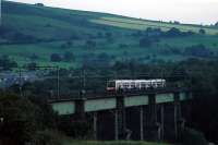 An evening Glossop service crosses Dinting Viaduct.<br><br>[Ewan Crawford 10/09/2006]