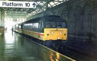 The 1210 to Birmingham about to leave, it will travel via Carstairs.<br><br>[Brian Forbes //1995]