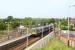 A Cumbernauld - Glasgow Queen Street train leaving Stepps station in July 2006.<br><br>[John Furnevel 26/07/2006]