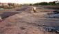 Looking west over the former Gullane terminus. The site is now a housing estate. The passenger station with a single platform was to the left and goods to the right. [? 1997]<br><br>[Ewan Crawford /03/1997]