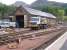 Truck come OnTrack Machine in sidings at Crianlarich.<br><br>[Colin Harkins 06/05/2005]