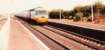 In InterCity days these HST 125s were the flagship trains between the capitals. The line to North Berwick leaves on the left beyond the platform.<br><br>[Brian Forbes //1982]