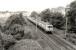 Much used Scotstoun Athletic venue to the left. A train for Airdrie passing former Victoria Park Jn.(left)<br><br>[Brian Forbes //1985]