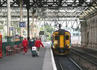 Activities at Waverley in September 2006 result in regular departure platform shuffles. Here the 1424 to Glasgow Central via Shotts waits to depart from platform 10 at the east end of the station.<br><br>[John Furnevel 08/09/2006]