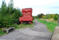At the point where the Stanhope and Tyne Railway crossed the Lanchester Railway this hot metal cauldron is a memento of the closed Consett Steelworks. The fortunes of the railways in the area were closely tied to the steelworks.<br><br>[Ewan Crawford 26/09/2006]
