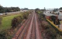 Road v Rail. The A90 Perth to Dundee dual carriageway accompanies the D & PR. The old Glencarse station is at the top of the frame. Photographed from St Madoes Road bridge.<br><br>[Brian Forbes /08/2006]