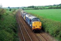 A trio of DRS locomotives pass Dalston heading to Carlisle.<br><br>[Ewan Crawford 27/09/2006]