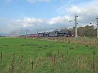 45407 and 62005 running to time west of Cardross with emcars from Fort William to Carnforth<br><br>[John Robin 14/10/2006]