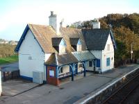 View from the footbridge towards the disused station building on the southbound platform at Helmsdale on 16 October 2006. A fine old building going to waste. <br><br>[John Gray 16/10/2006]