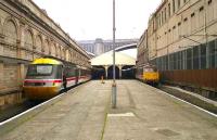 Waverley in July 1991 with an HST and a class 86 locomotive waiting to depart.<br><br>[John McIntyre 06/07/1991]
