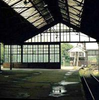 Looking out from the trainshed on the south side of the triangle at Bishop Auckland station towards the east box around 1977. [See image 19360]<br><br>[Ian Dinmore //1977]