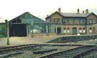 View west towards the old Bishop Auckland station from alongside Bishop Auckland East box in the 1970s. The Crook platform is under the  trainshed on the left with the Durham platform turning off to the right.<br><br>[Ian Dinmore //]