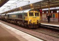 66511 passes through Paisley Gilmour Street with a loaded coal train<br><br>[Graham Morgan 25/10/2006]