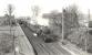 BR Standard 2-6-4T 80111 runs south through Auchnagatt on 15 May 1959 with a Peterhead - Aberdeen freight.<br><br>[G H Robin collection by courtesy of the Mitchell Library, Glasgow 15/05/1959]