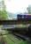 Railway over railway. Northbound Sprinter passing Inveruglas. The steeply inclined track in the foreground runs to the head of the pipes. Loch Lomond and Ben Lomond in the backdrop.<br><br>[Ewan Crawford 04/10/2006]