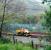 Southbound speeder at Glen Douglas. The island platform of the station was between the speeder and the track closer to the camera.<br><br>[Ewan Crawford 04/10/2006]