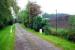 Nice railway theme driveway markers! Looking west at Blencow. Goods yard to right and approach to station, now a house, straight ahead.<br><br>[Ewan Crawford 27/09/2006]