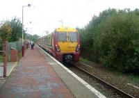 Looking west, 334040 pulls away from Whinhill with a service for Wemyss Bay<br><br>[Graham Morgan 25/10/2006]