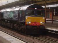 66401 passing through Paisley Gilmour Street with the daily Elderslie to Grangemouth freight service<br><br>[Graham Morgan 07/11/2006]